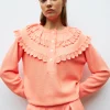 blouse en maille à maxi col