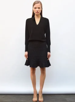 jupe courte en maille à frange