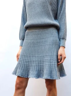 jupe courte en maille à frange