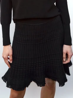 jupe courte en maille à frange
