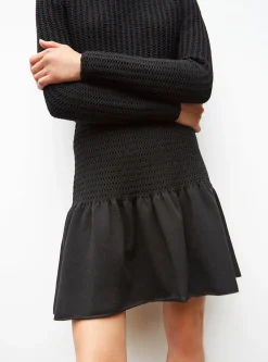 jupe courte en maille smockée