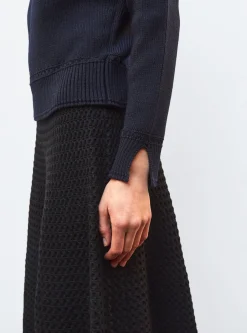 pull droit détails tressés