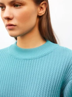 sweater en maille torsade