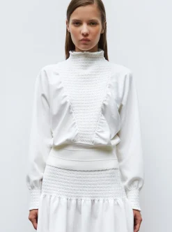 top à plastron smocké