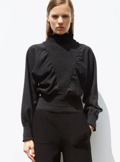 top à plastron smocké