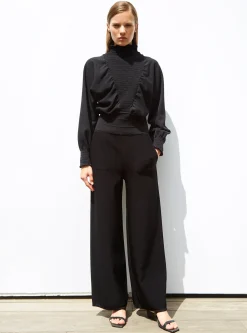 top à plastron smocké