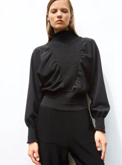 top à plastron smocké